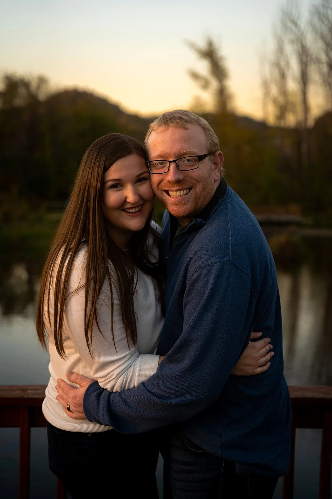 Couple poses at sunset