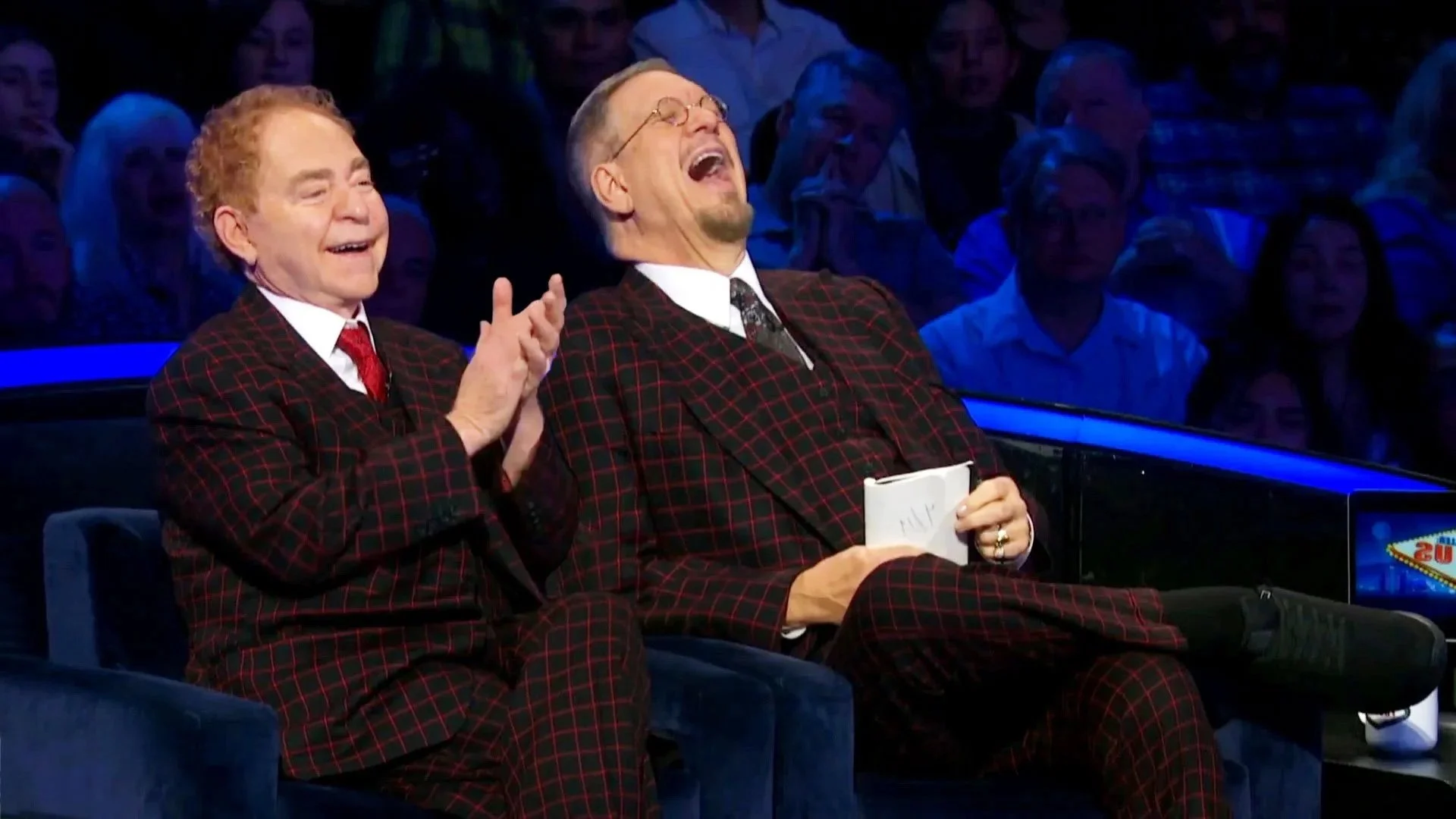 Penn & Teller laughing at something Glenn said.