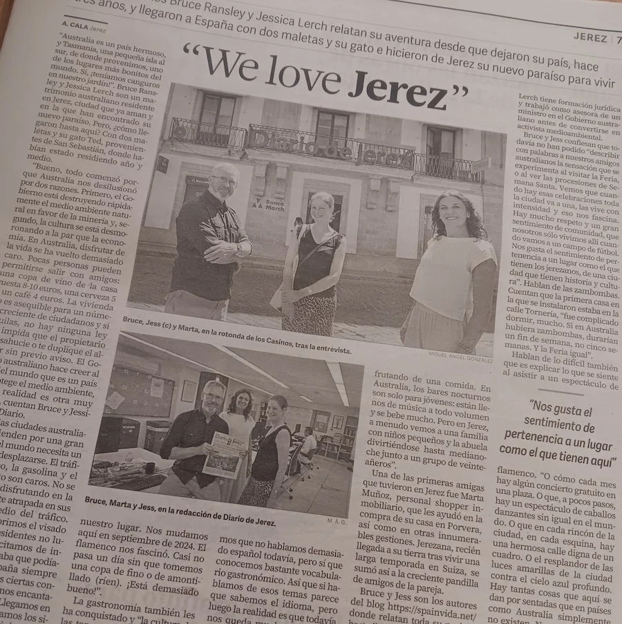 A newspaper clipping with a story and photos of three people