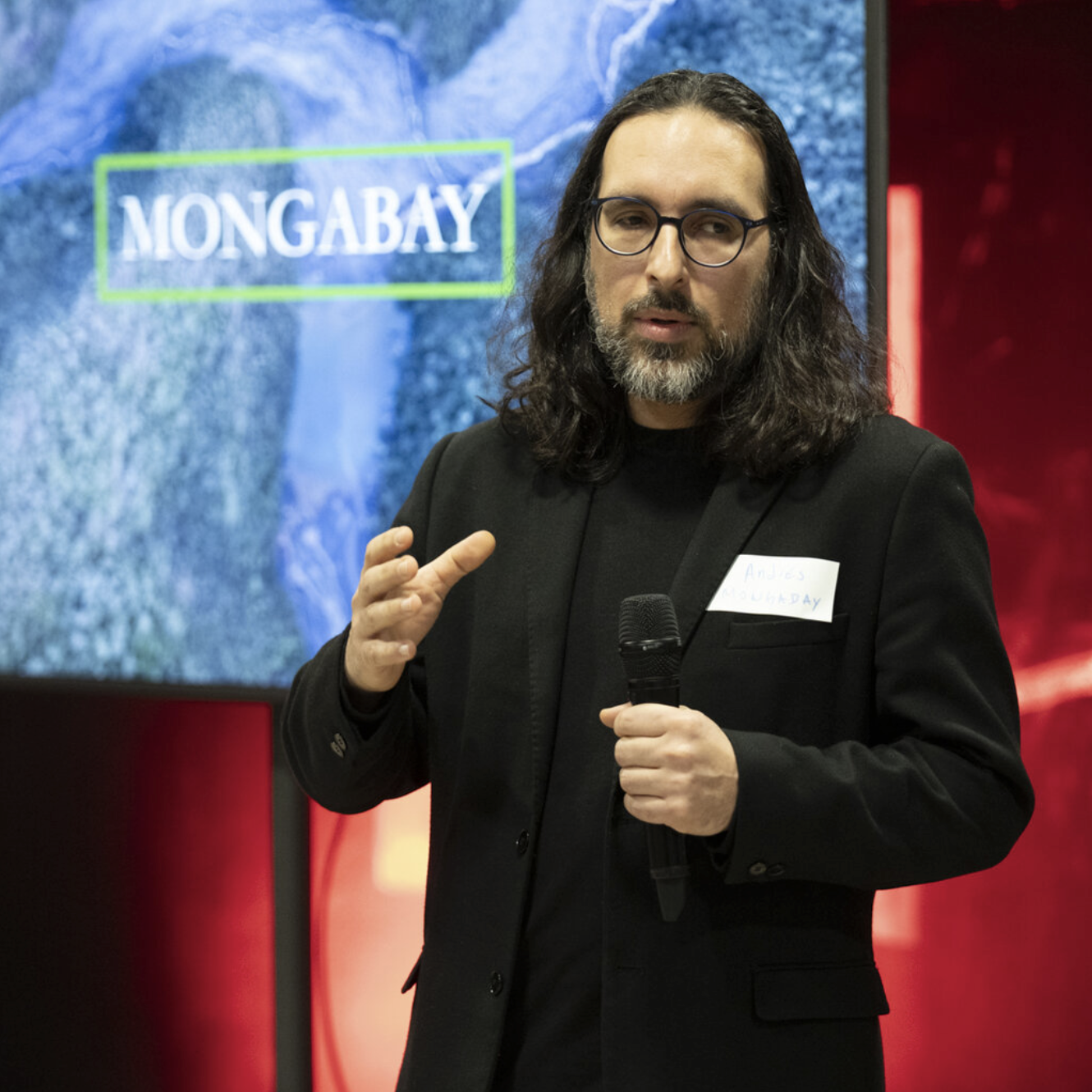 Photo of Andres Alegria during a presentation at Mongabay event.