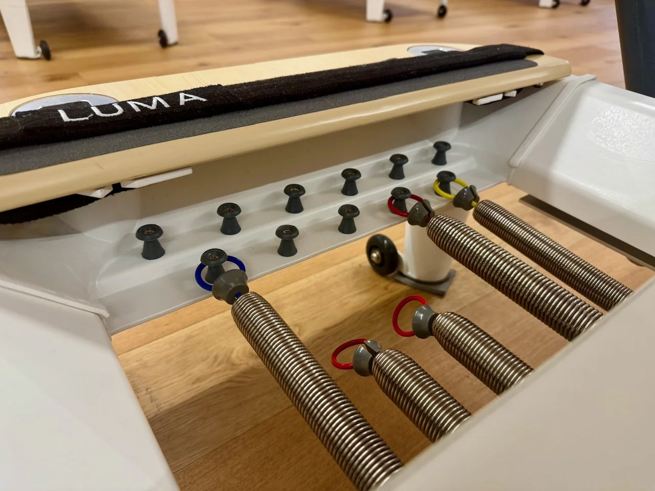 Close-up of Reformer spring resistance system at Luma Pilates, Edinburgh