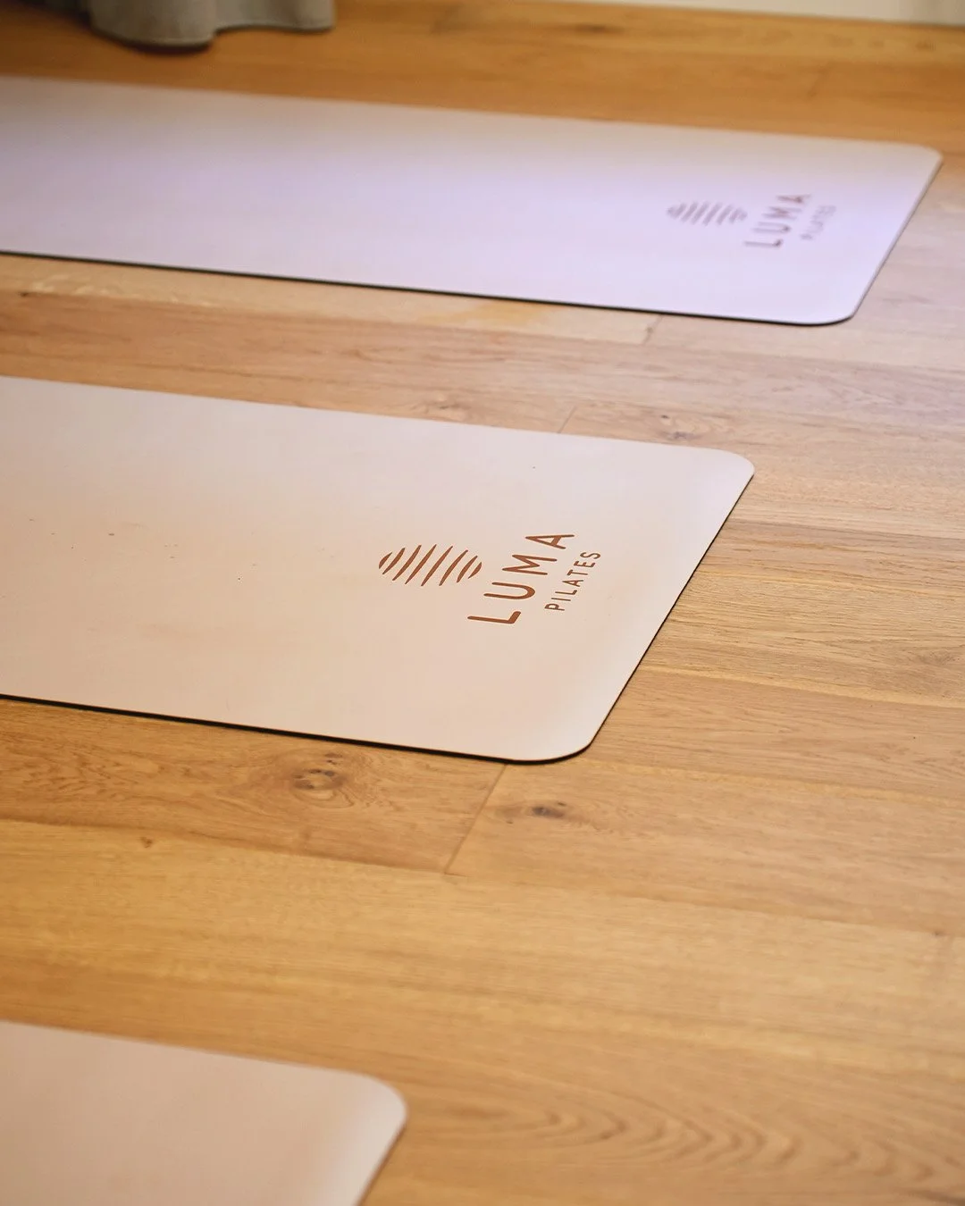Luma Pilates mat on a wooden studio floor, Edinburgh New Town