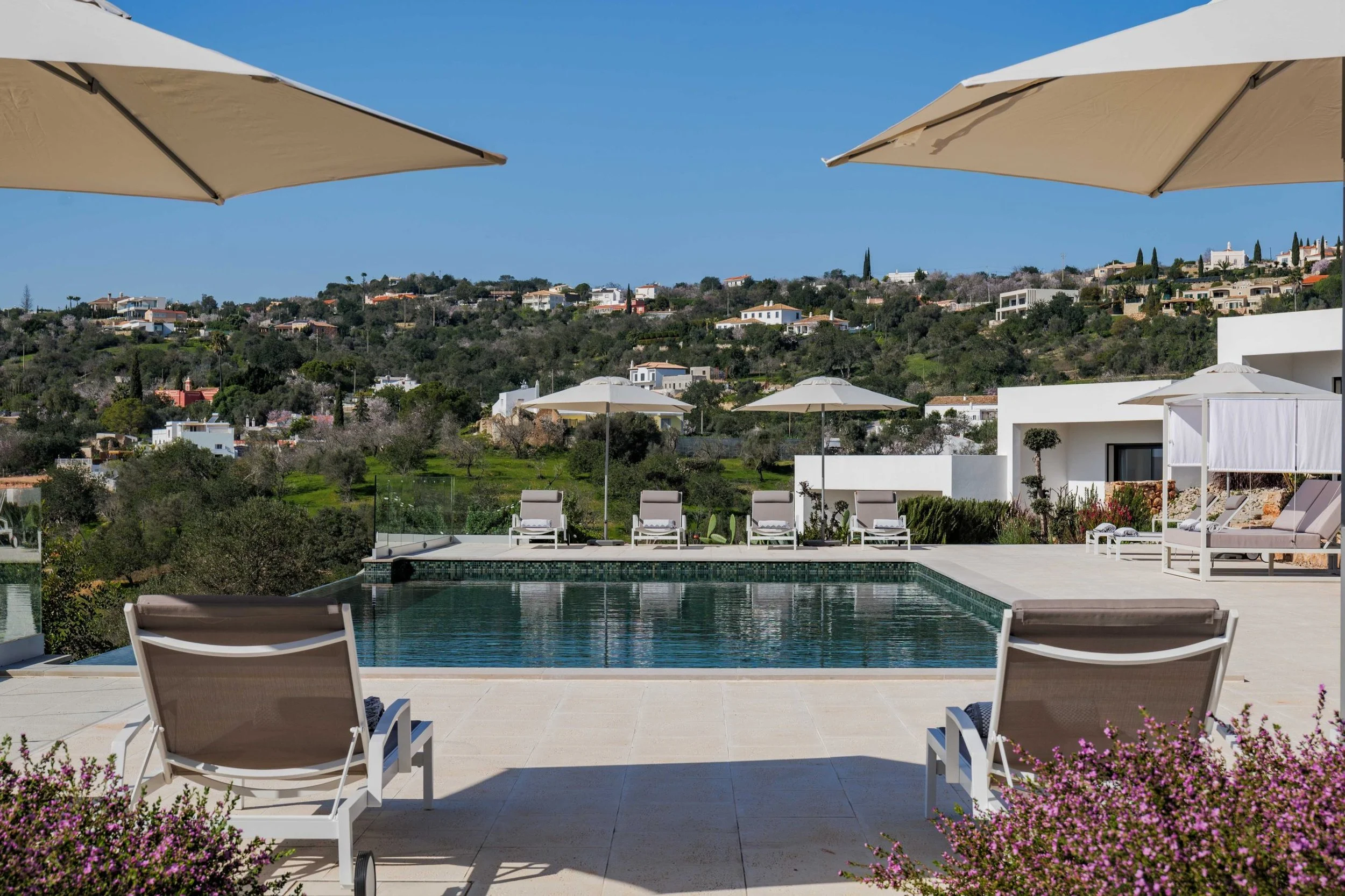 The infinity pool and terrace at Villa Majestosa