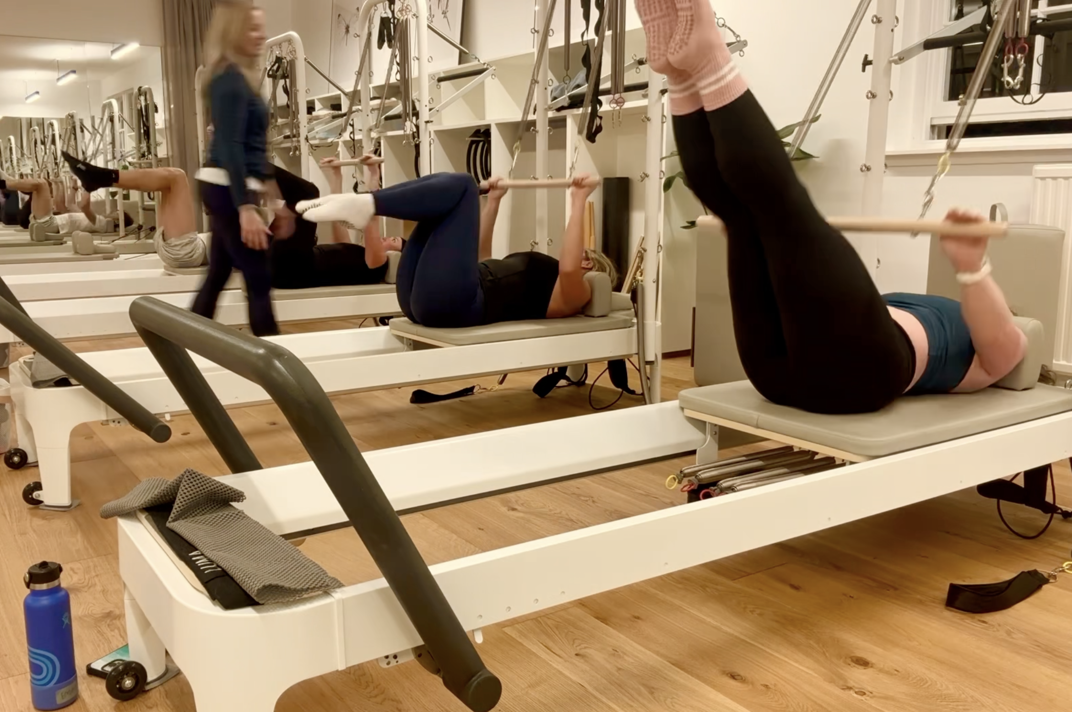 Lucia guiding clients during some intense core work at Luma Pilates, Edinburgh