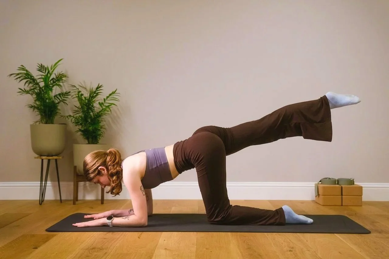 Catrin Dawson, Pilates instructor, demonstrating a core exercise at Luma Pilates, Edinburgh.