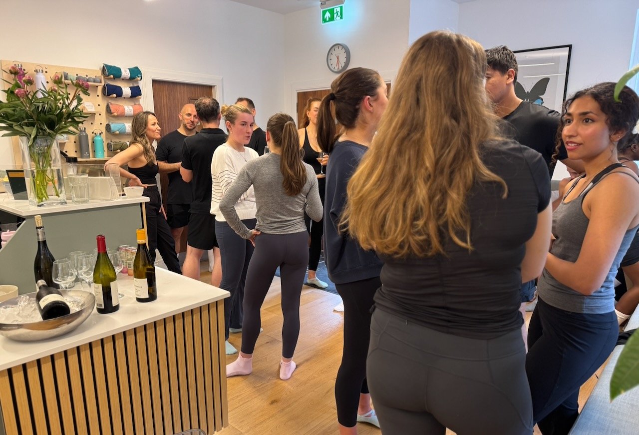 Luma Pilates clients gathering at a First Fridays community event at the studio in Edinburgh New Town