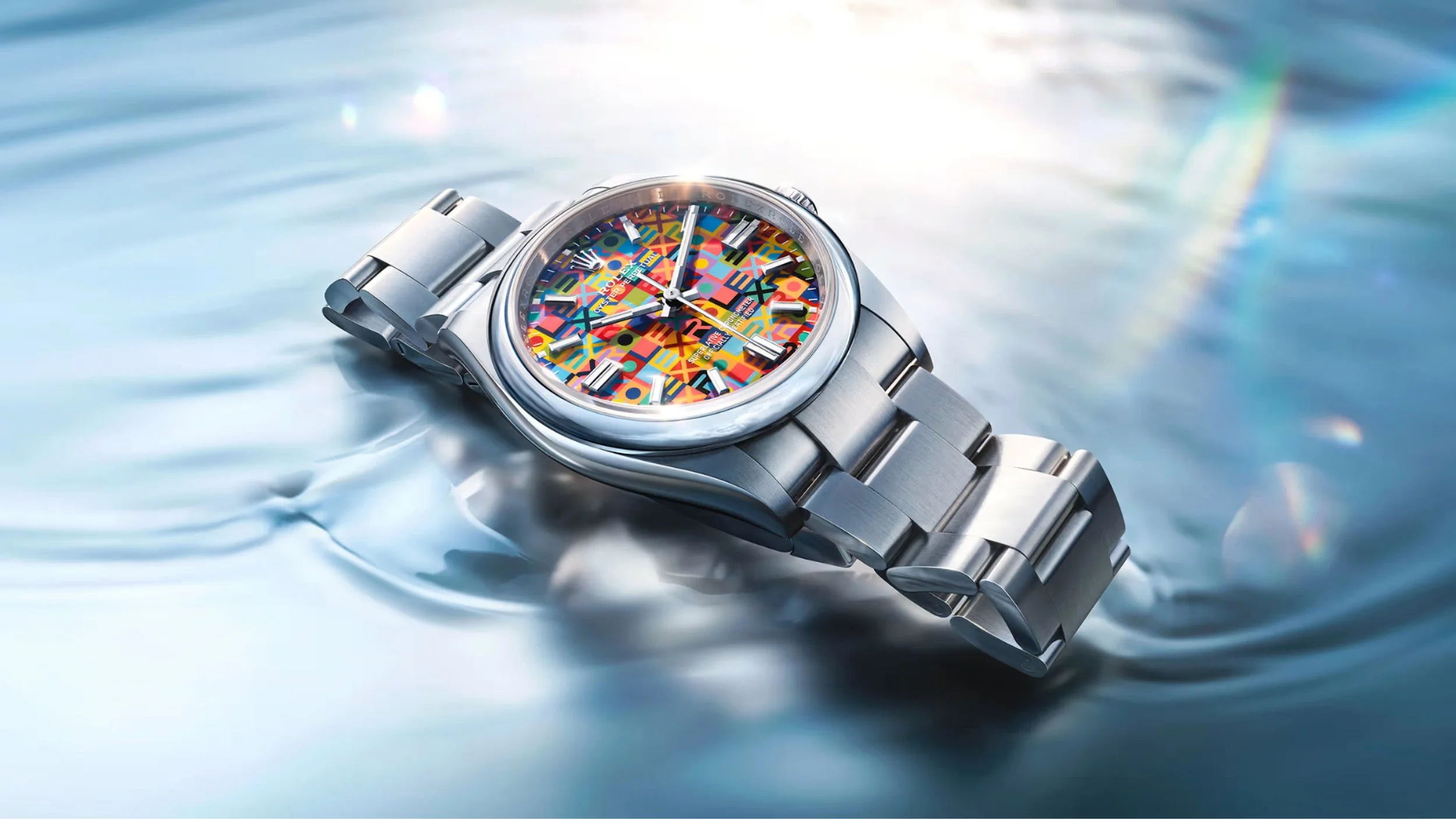 rolex-new-watches-2026-the-oyster-perpetual-36-roller-loop-m126000-0016-beauty-shot-laying-pop-in.jpg