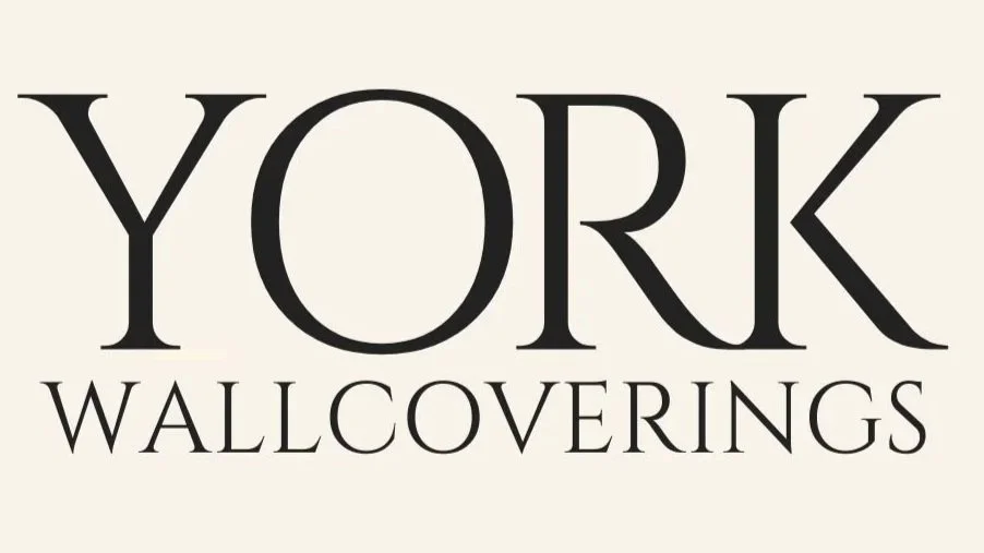Logo for York Wallcoverings featuring the company's name in black font on a beige background.
