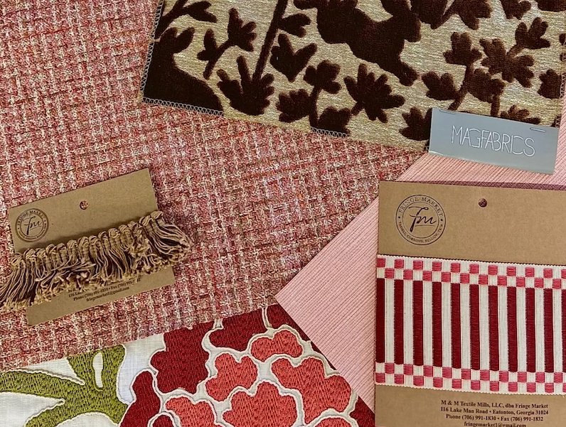 fabric and trim options for custom upholstery including patterned textiles and decorative fringe