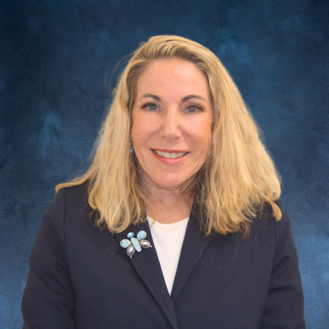 Nancy Norman Headshot - Blue.png