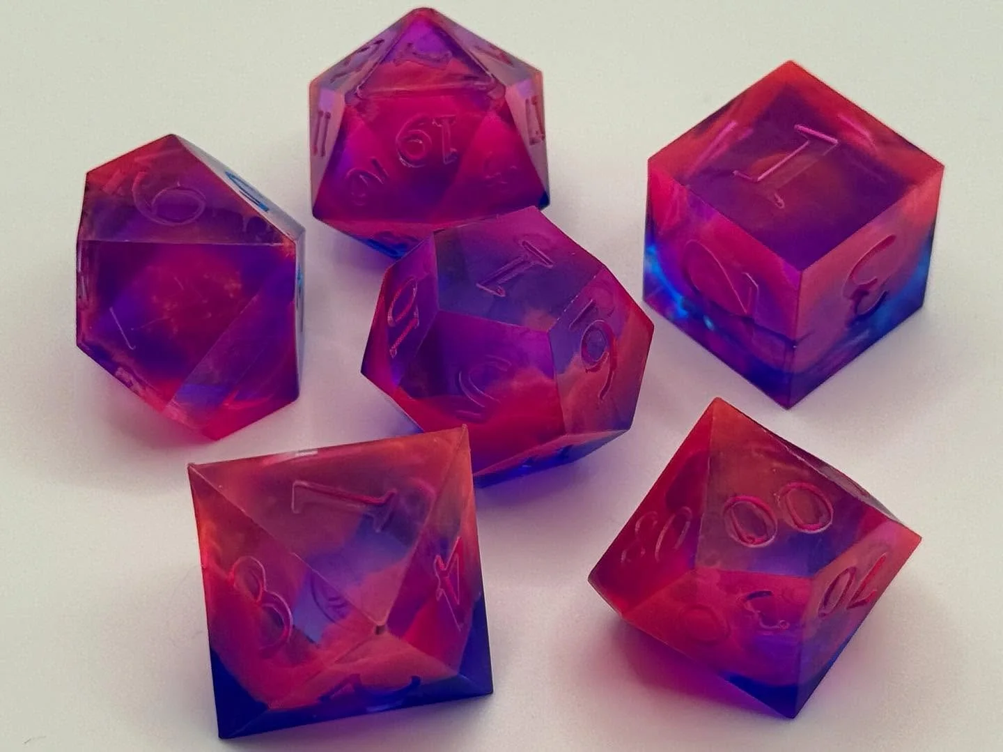 Out of this world~🪐

A happy accident turned this set into a gorgeous pink nebula. Cosmic charm meets critical hits. 💕 ✨

#pinknebuladice #nebuladice #galaxydice #cosmicdice #stardustdice #resindice #handmadedice #dnddice #ttrpgdice #dicegoblin #di