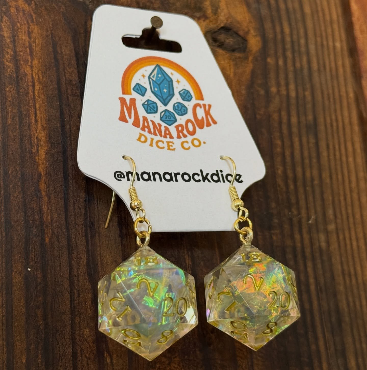 Reminder- your favorite dice can become your favorite jewelry too 🎲✨

#DiceJewelry #ResinJewelry #HandmadeDice #DiceEarrings #DicePendant #DNDJewelry #GamerJewelry #TTRPGJewelry #DiceGoblin #ResinArt #FantasyJewelry #NerdyJewelry #GeekJewelry #DiceM