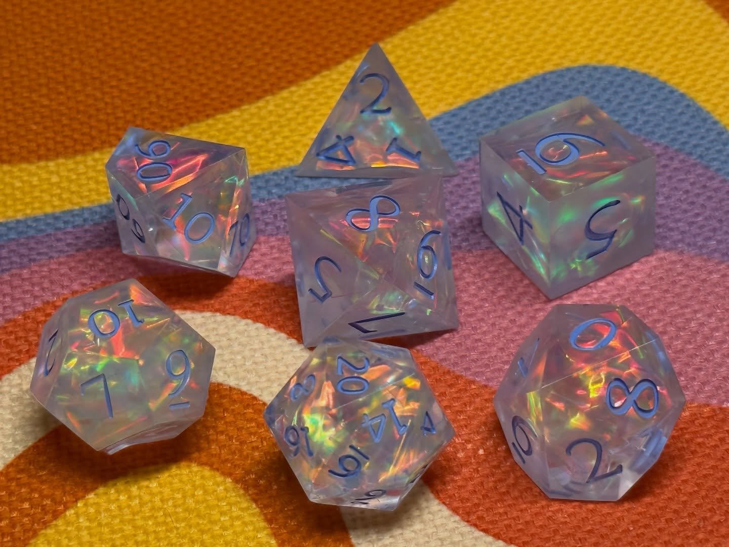 This set caught the light and kept it with pure red hot iridescent GLOW ✨🔥

#dice #dicecollection #tabletopgaming #rpgaccessories #criticalrole