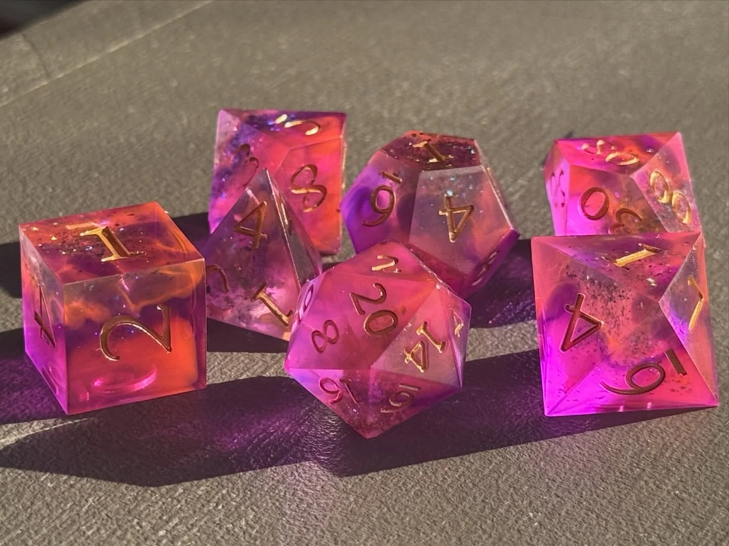 I&rsquo;ve been in G R I N D mode gearing up for Tulsa Gaming Con this Friday-Sun 💥

I&rsquo;m bringing FIFTY new sets of dice with me! This funky little nebula set is up for grabs as a raffle item- come try out some new tabletop games, say howdy to