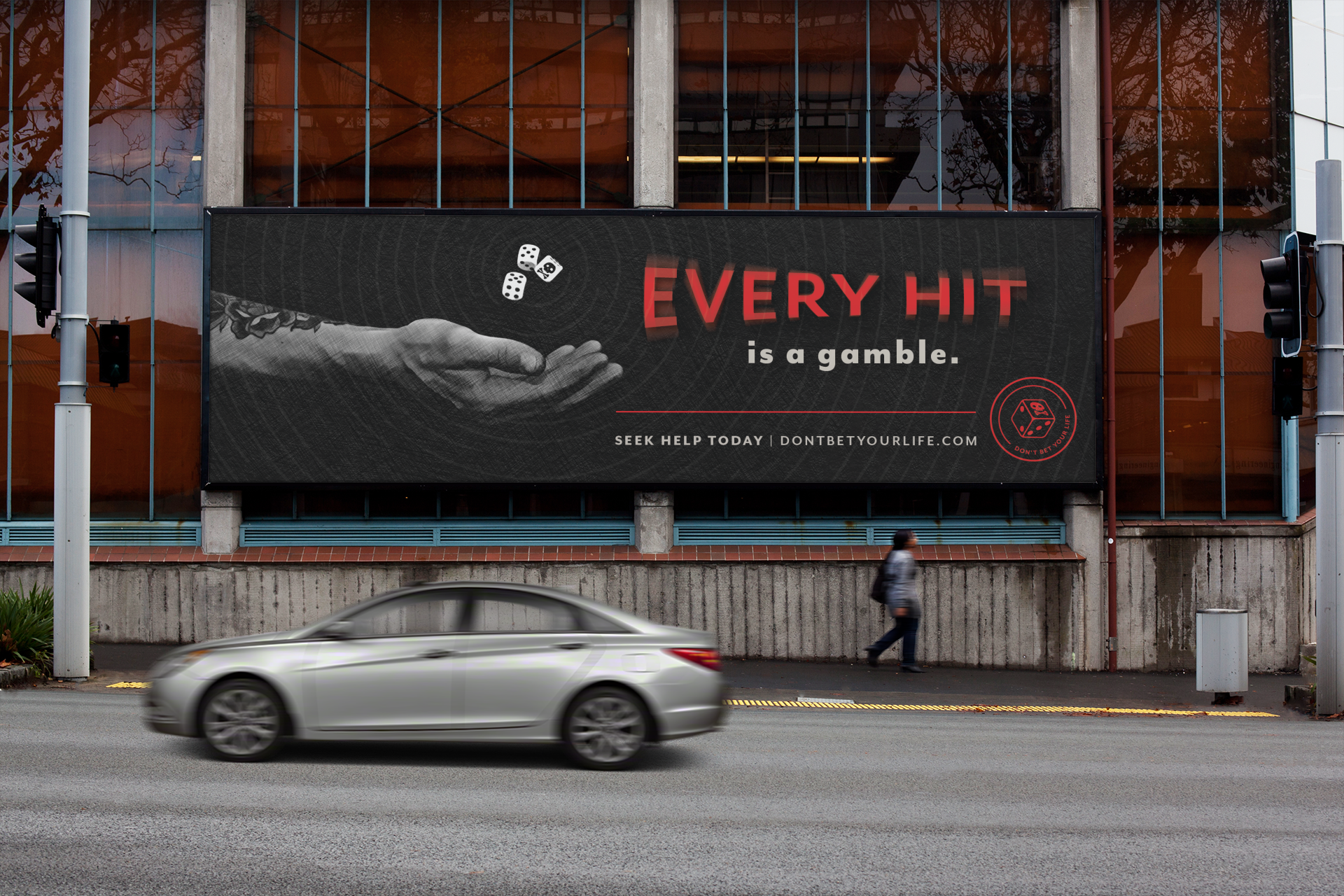 mockup-of-a-billboard-placed-on-a-glass-building-by-a-street-2880-el1.png
