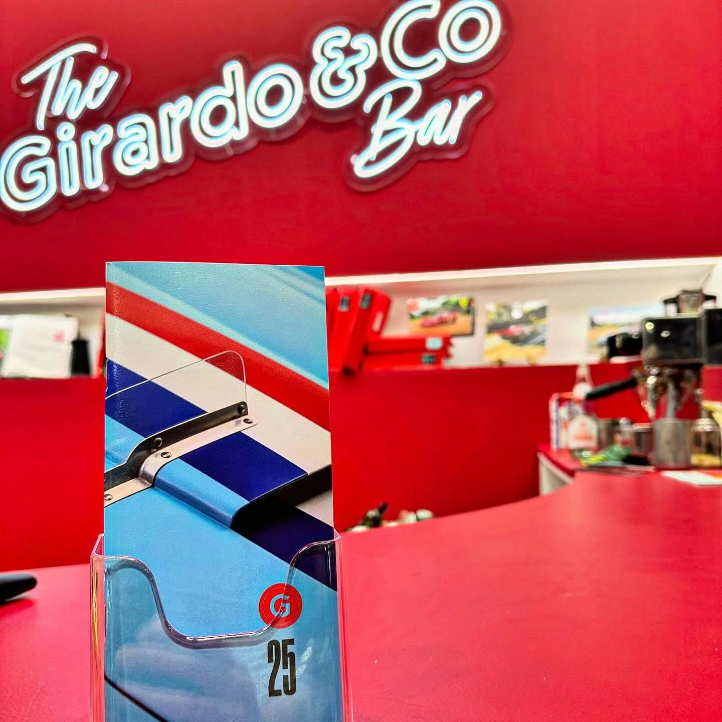 Our work on display at Retromobile 2025. We love working for @girardoandco they just get it! #girardoandco #retromobile #graphicdesign #motoringdesign #carshow #lovedesign
