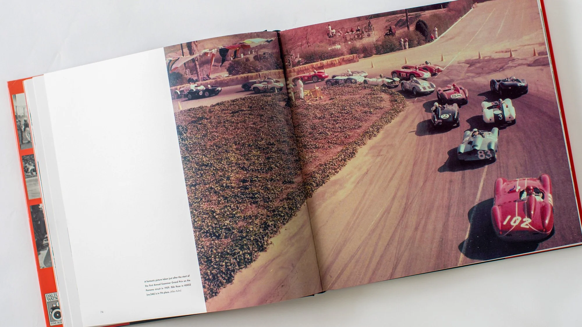 Open book displaying pages about a Maserati sports car, featuring text, images, charts, and specifications for Maserati Tipo 300/S, with a large photograph of a vintage Maserati 300 S race car on the right page. Bespoke book designed by Motion Ltd