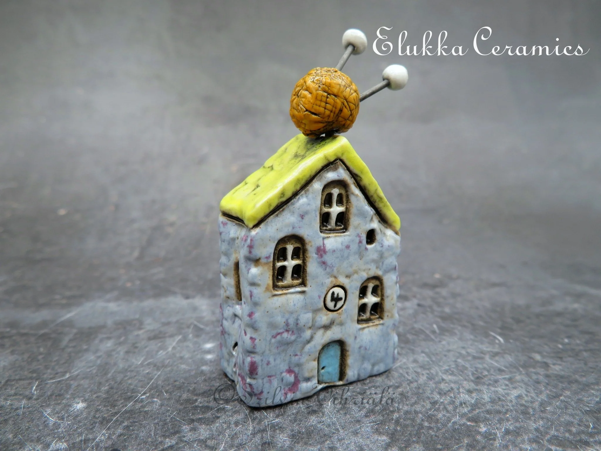 Collectible TINY Mediterranean Town House by elukka...Pale Lavender Walls &  Lemon Roof with Number 4 House Plaque, Ball of Yarn and Knitting Needles