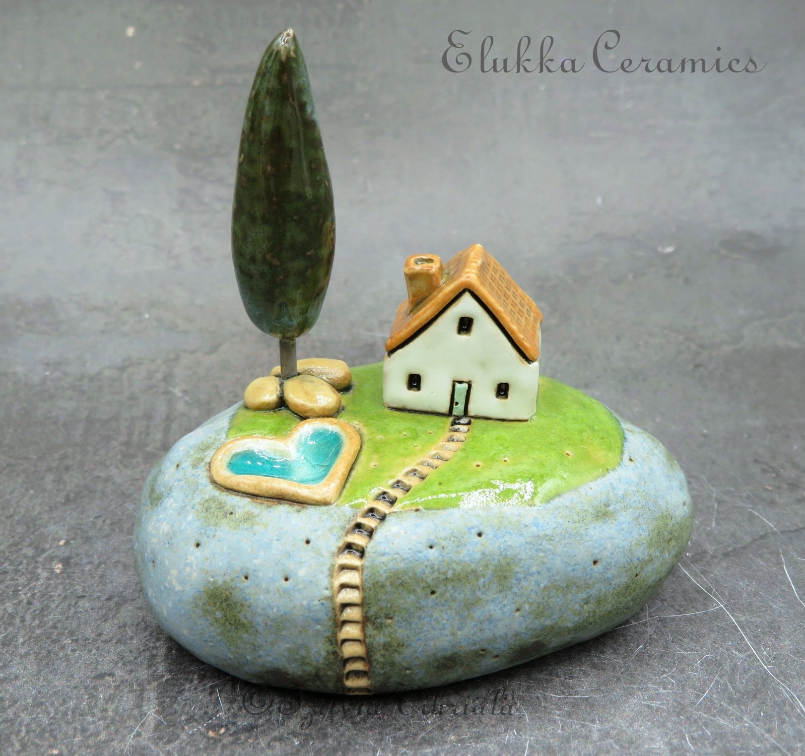 18..Tiny Ceramic Hilltop Cottage Sculpture by elukka