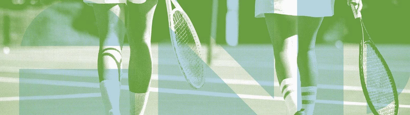 Two female tennis players walking on a tennis court, each holding a tennis racket, with a net and other players in the background.