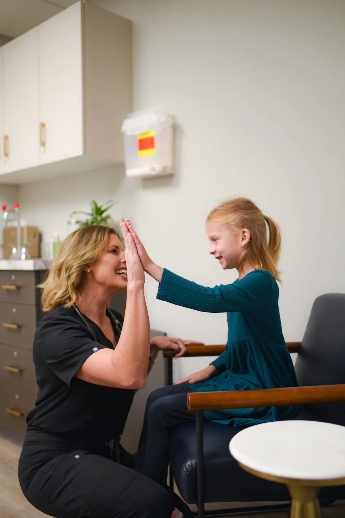Dr. Kelli Peiffer and a girl patient.