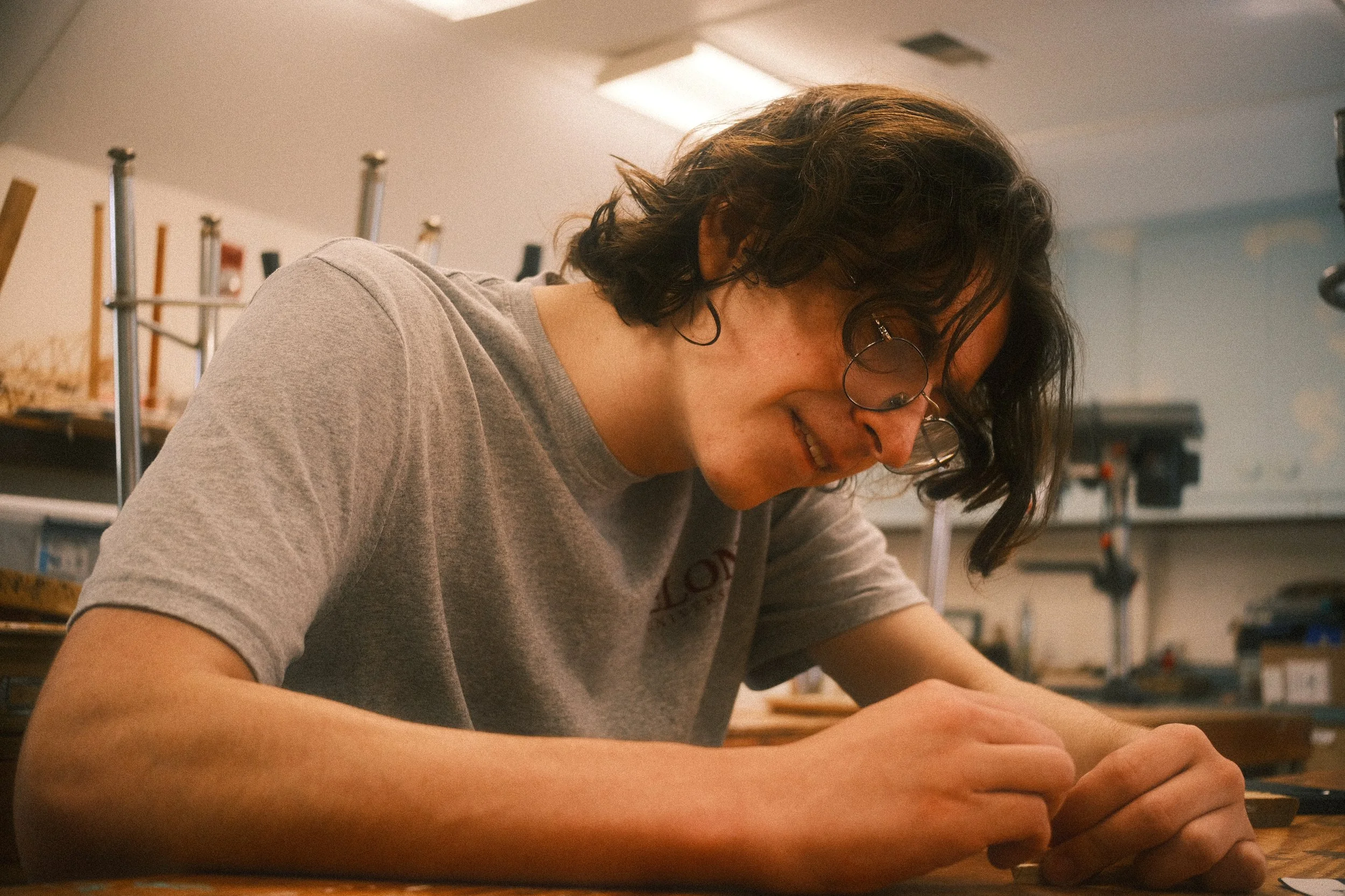 A student works tirelessly on an engineering project.