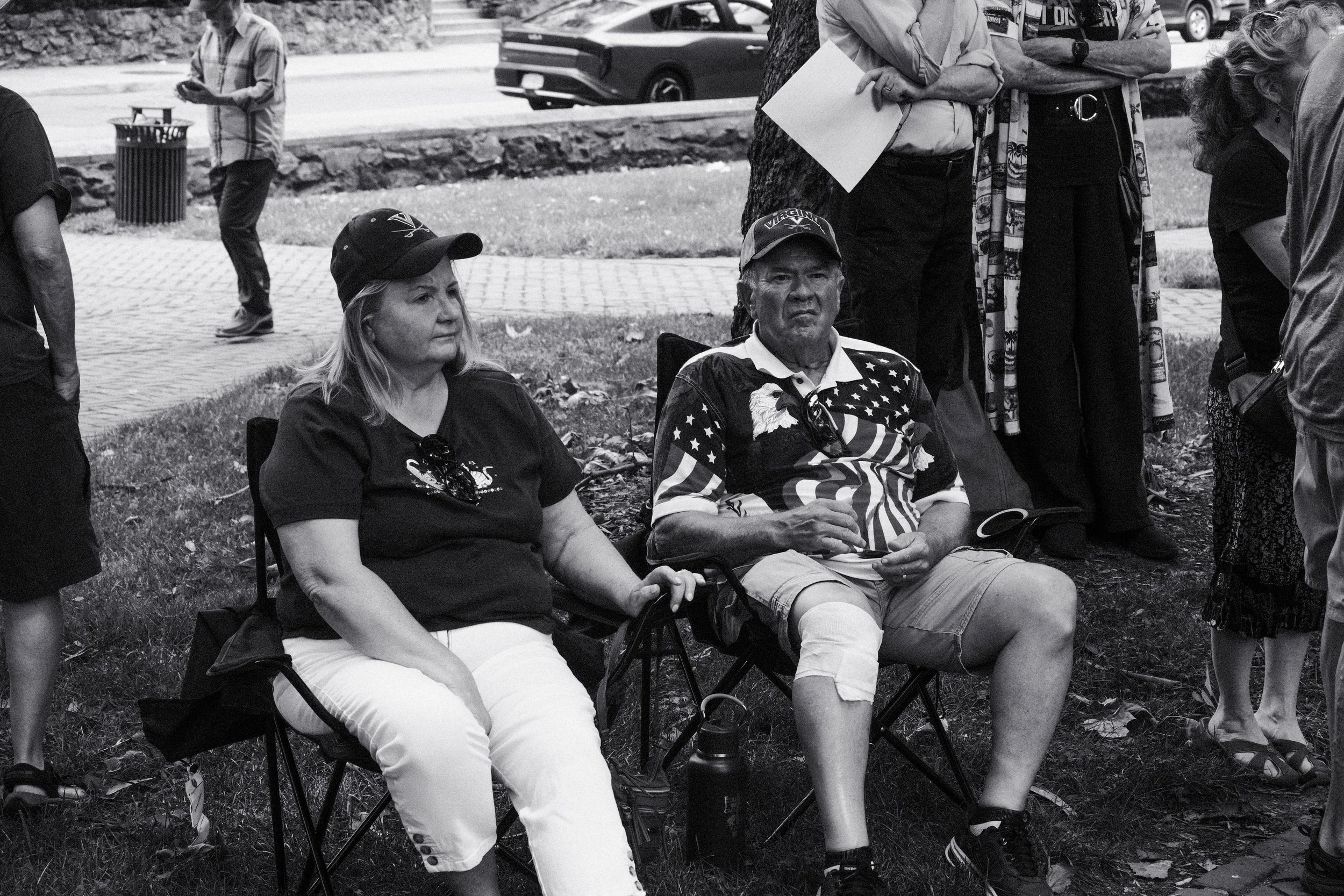 An older couple attending a protest.
