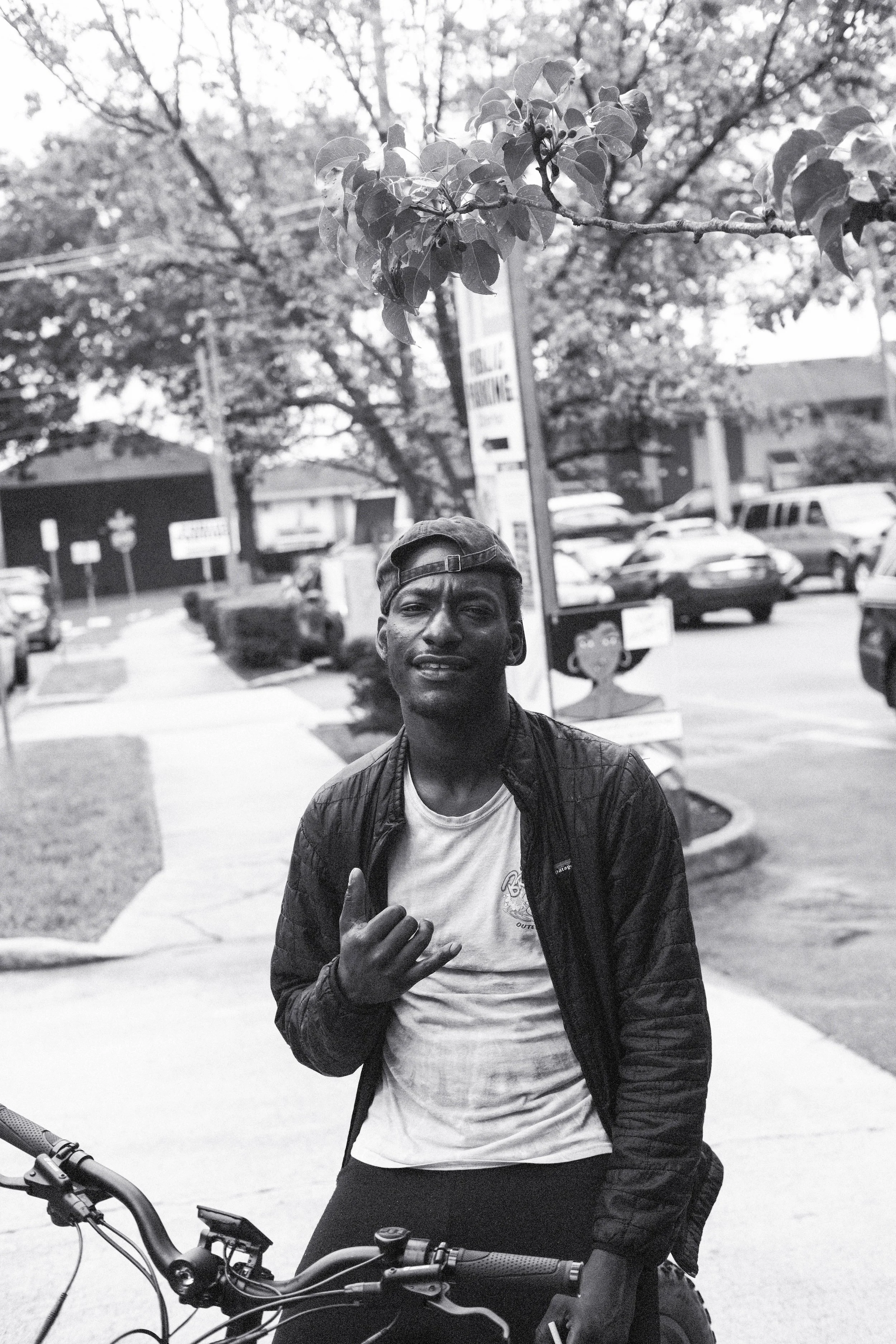 A man biking downtown.