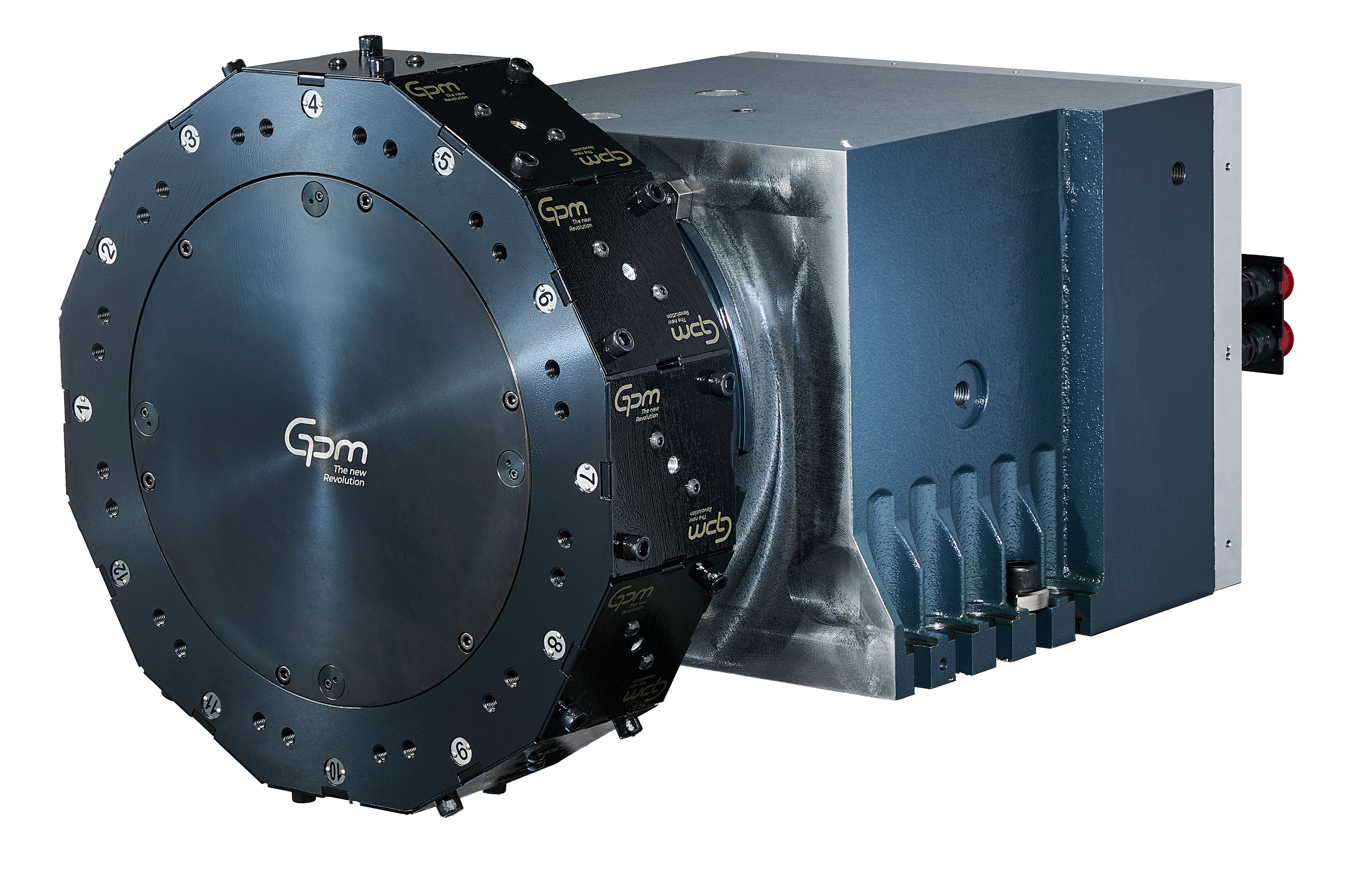 Close-up of a high-tech industrial machine with a large circular component labeled 'Gpm' connected to a rectangular housing, set against a plain background.