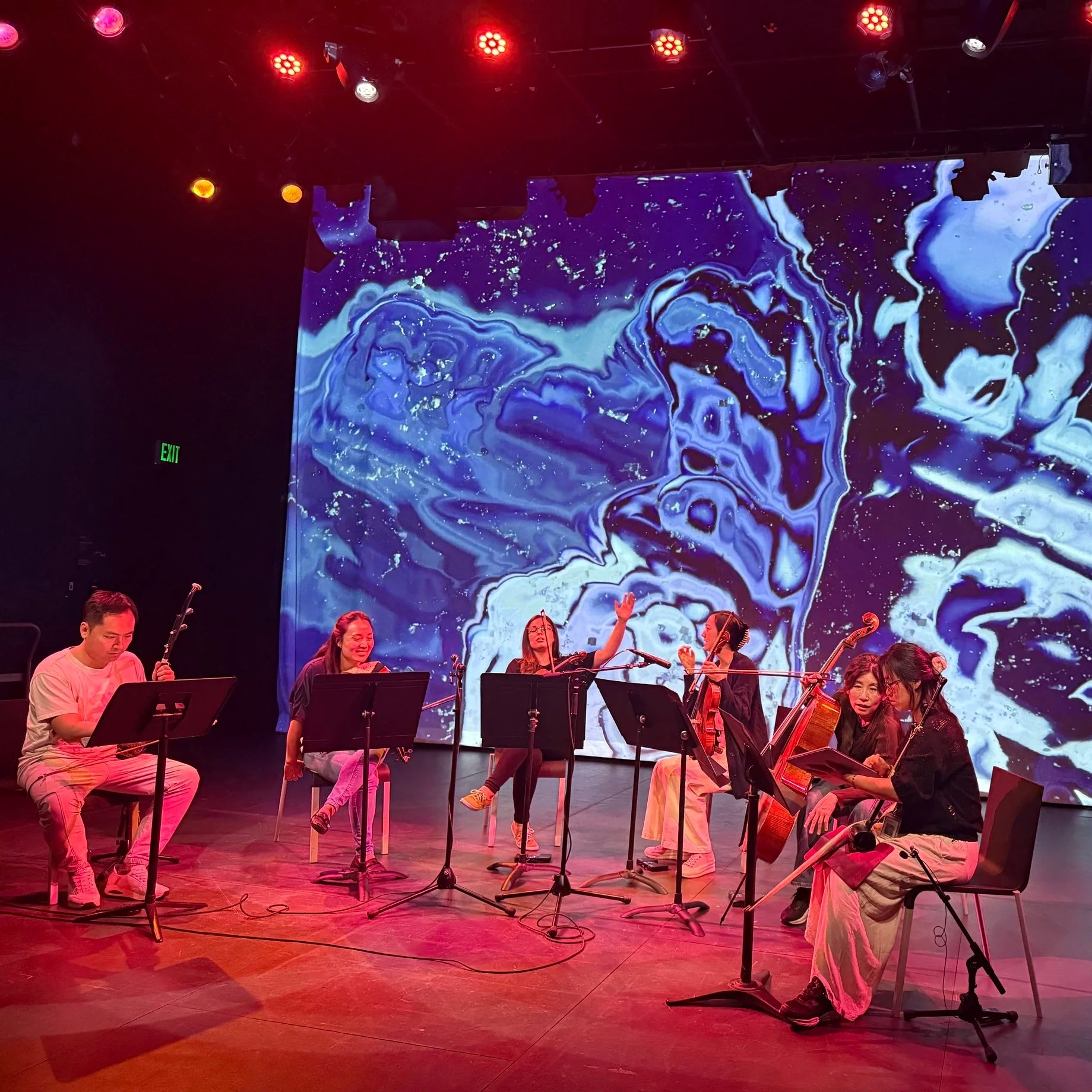 Photo of Calling of the Whales performance from Strings Attached Across the Pacific, composed and produced by Hee Yun Kim; Elevator Project at AT&T Performing Arts Center
