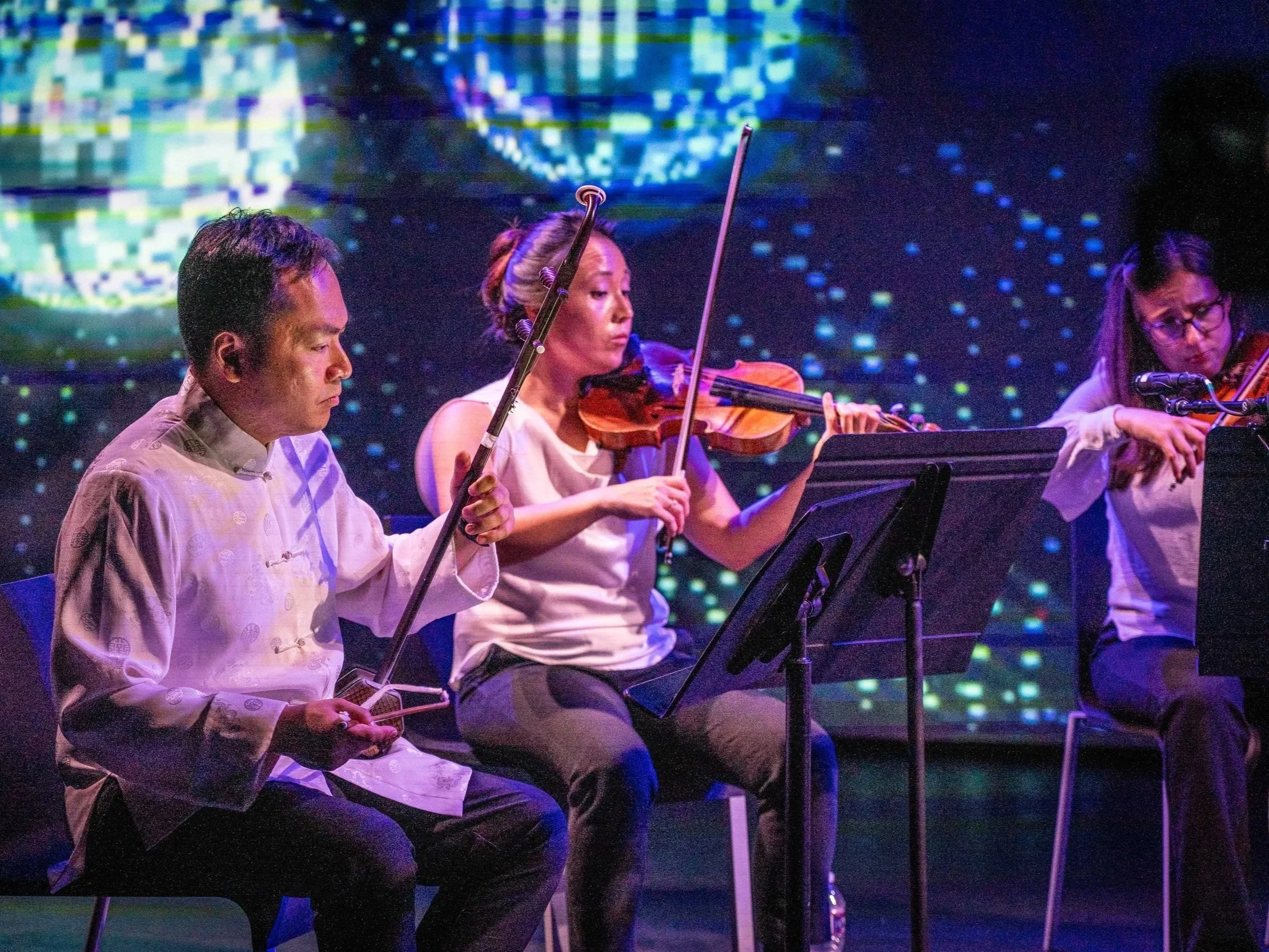 Photo of Calling of the Whales performance from Strings Attached Across the Pacific, composed and produced by Hee Yun Kim; Elevator Project at AT&T Performing Arts Center