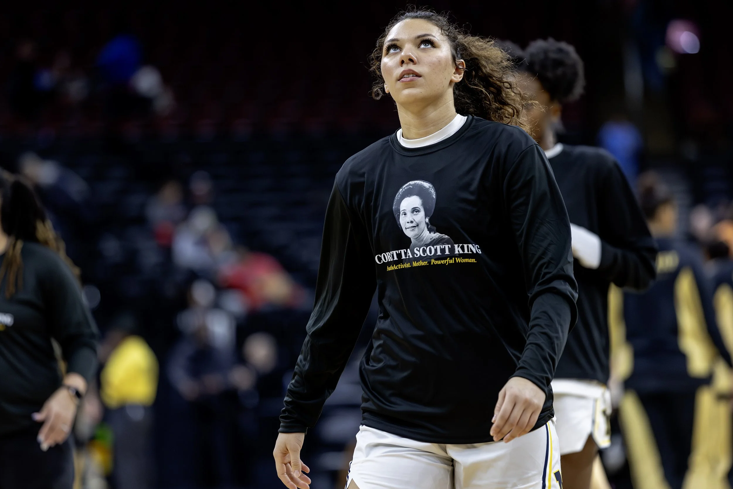 Front of MLK day T-Shirt dedicated to Coretta Scott King, for team & coaches to wear for warm-ups for 1/19/2026 game