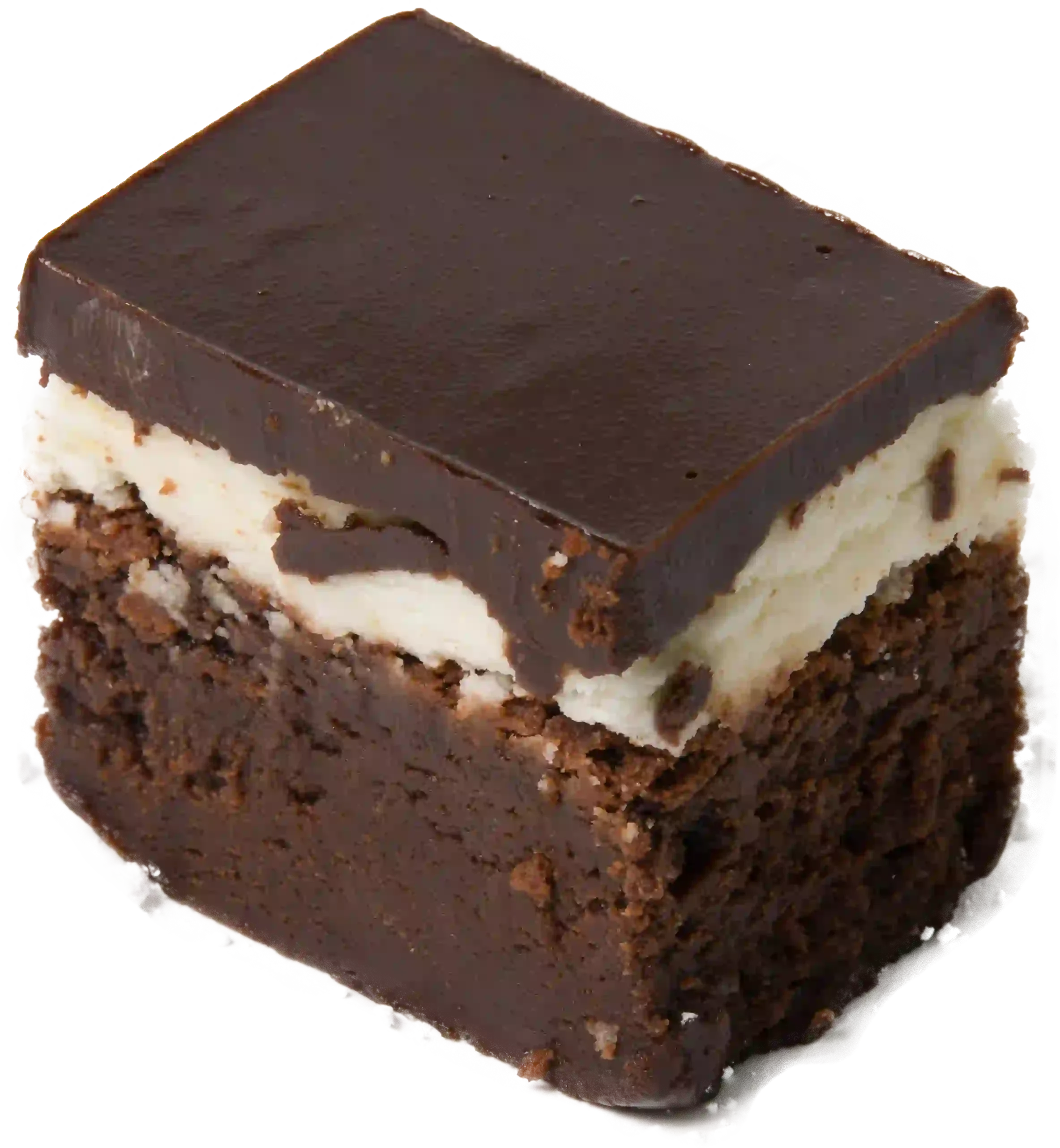 A close-up of a layered chocolate and vanilla cake with chocolate frosting on top and crushed chocolate cookies on the sides.