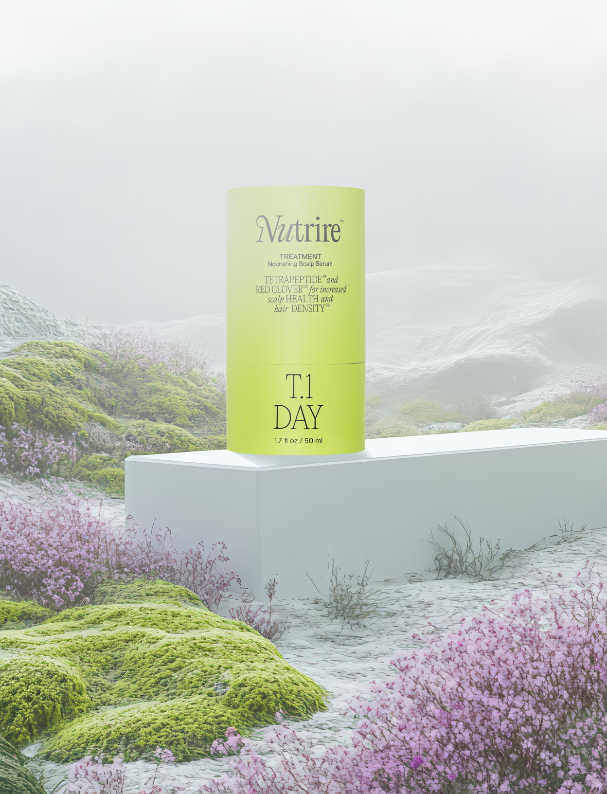 A cylindrical bottle of Nutrike T1 Day scalp treatment on a white pedestal outdoors, surrounded by pink and green moss and plants, with a misty landscape background.