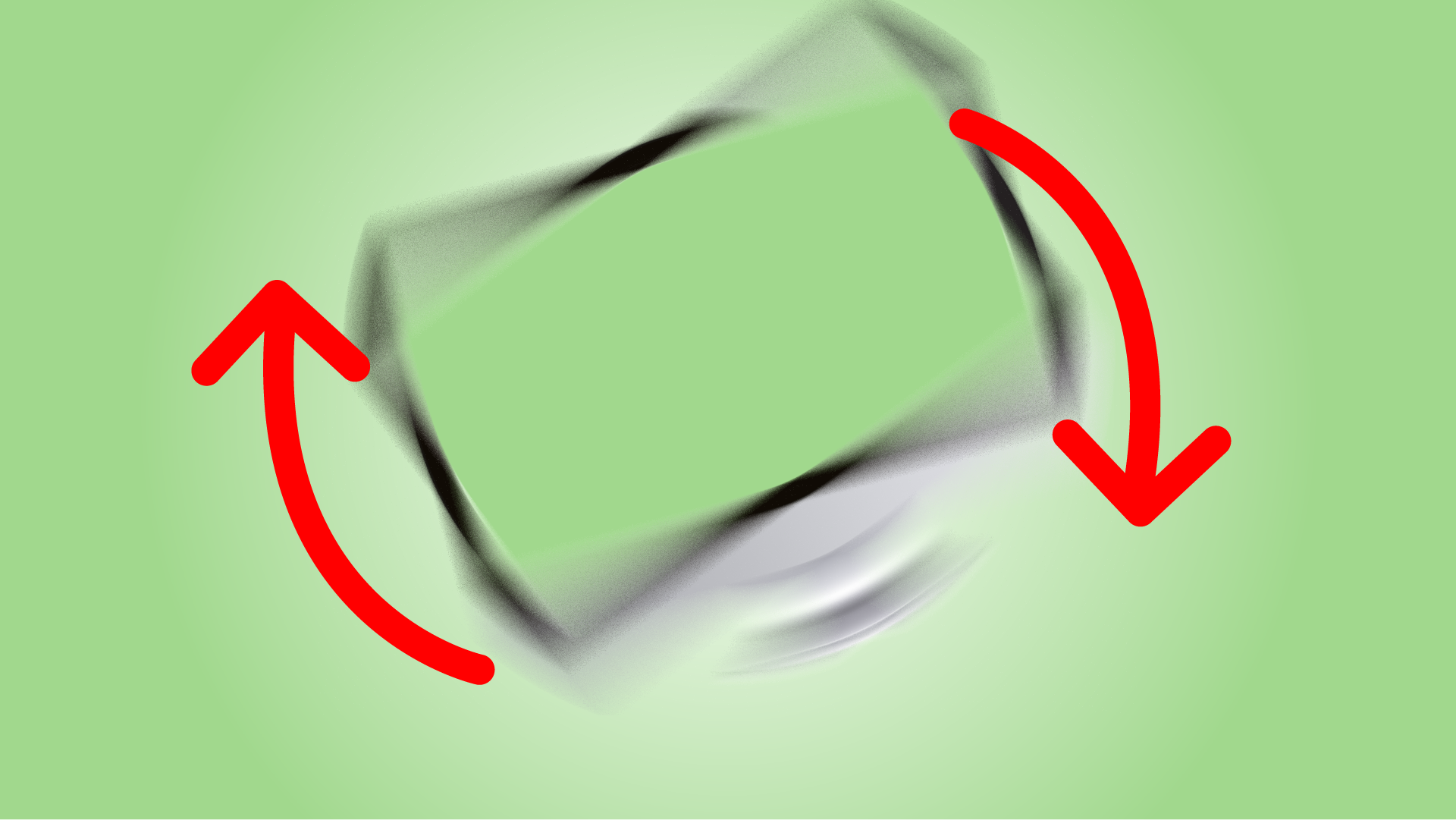 A blurry image of a rectangular object with rounded edges and green color, on a light green background. Two red arrows forming a circular motion indicate a flipping or rotating action.