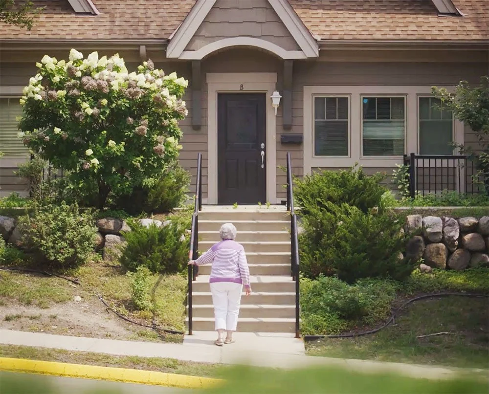LaDonna walking up the steps