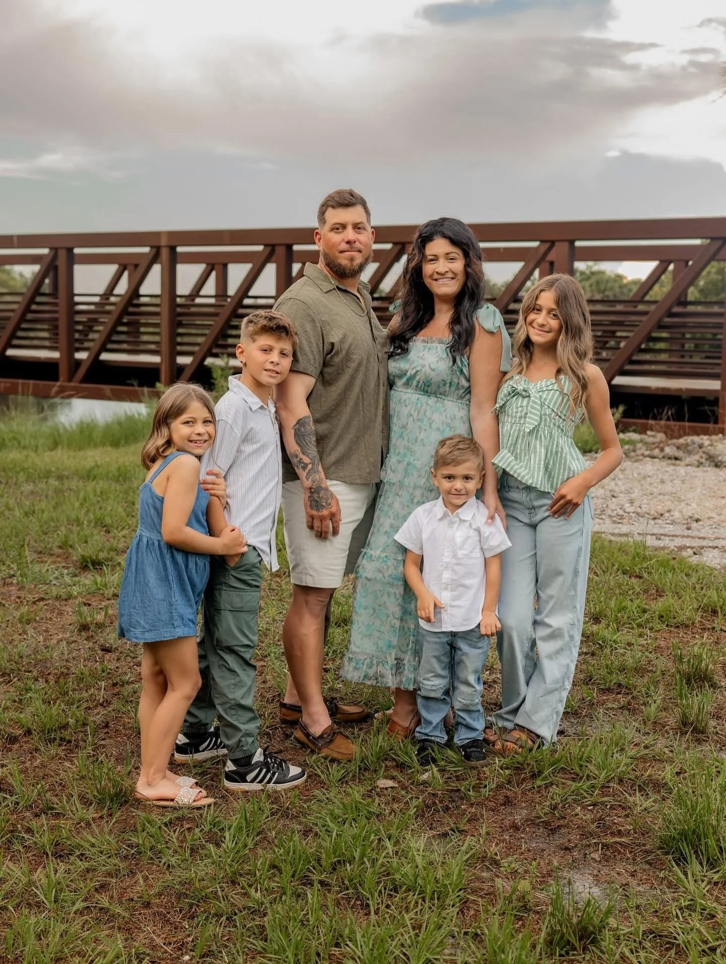 Family at Dream Athletics cheer gym outdoor event.