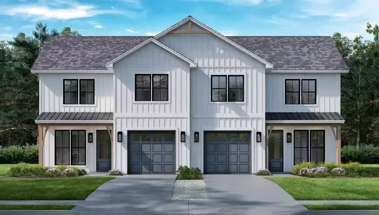 A modern white duplex house with gray garage doors, black window frames, and a metal roof, surrounded by green lawns and trees.