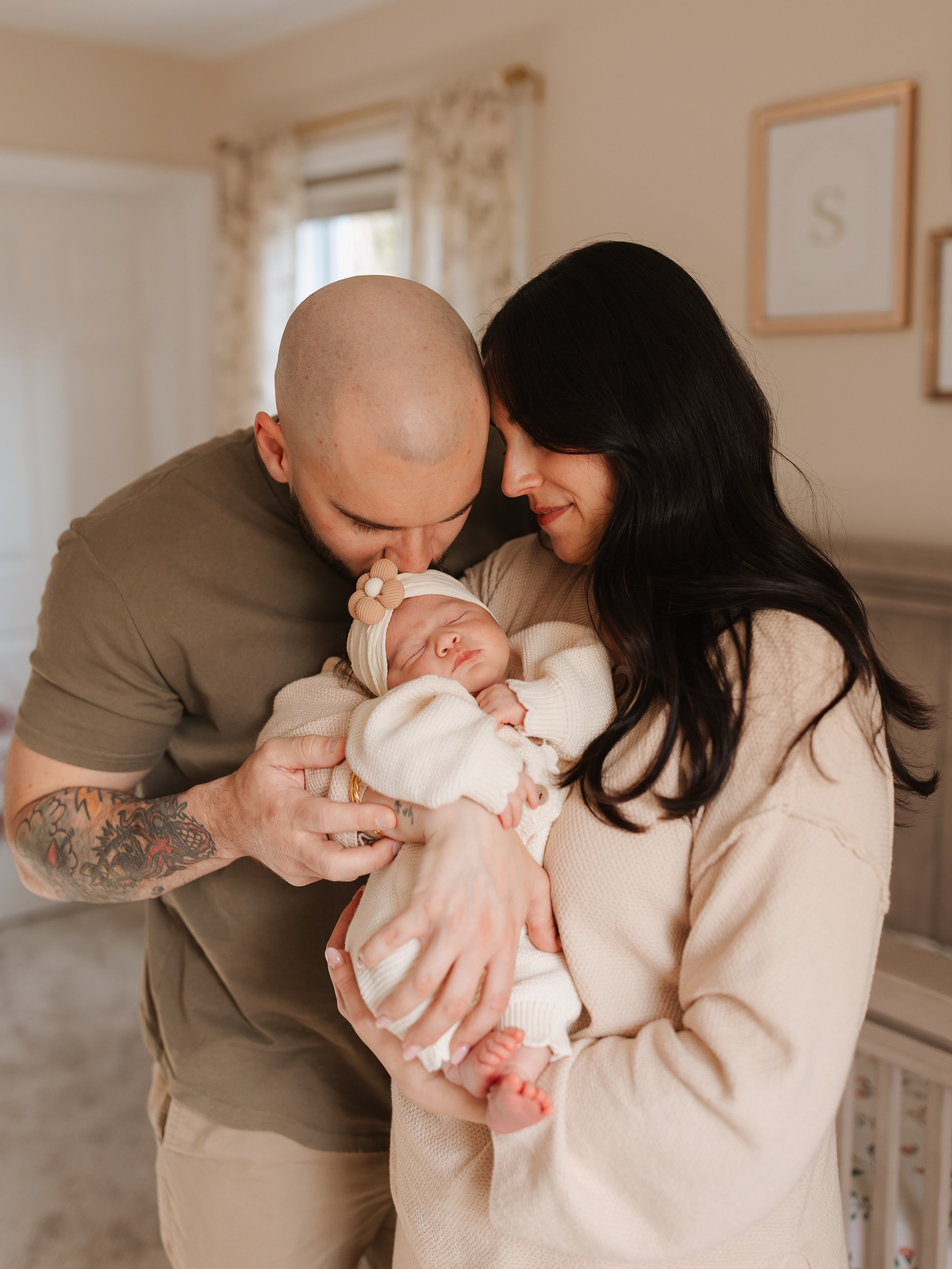 One day, these moments will feel impossibly small.

The newborn scrunch.
The sleepy stretches.
The way big brother carefully leans in for just one more kiss.

Nothing about this season lasts forever, which is exactly why it deserves to be documented.
