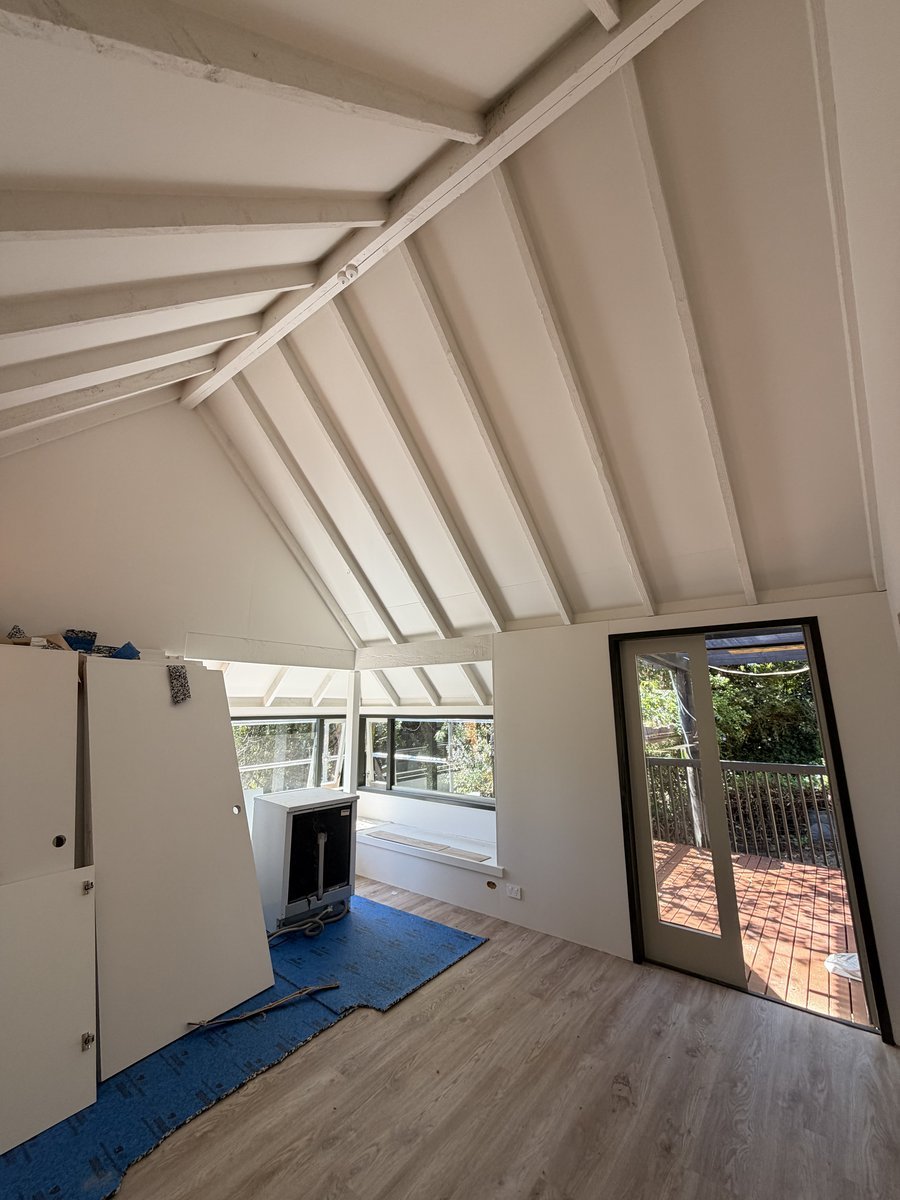 interior-vaulted-ceiling-beams-painted-white-renovation-wip.jpg