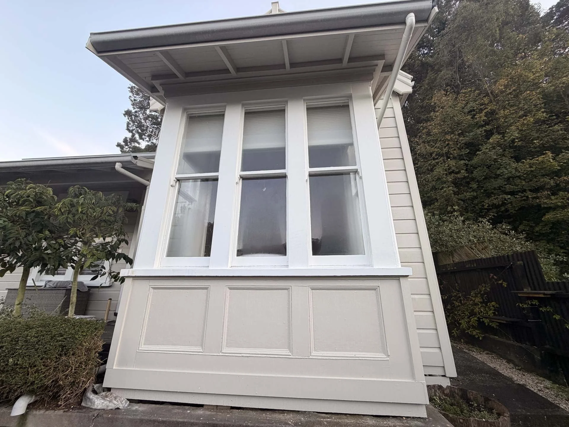 coote-road-bay-window-exterior-freshly-painted-white-trim.jpg