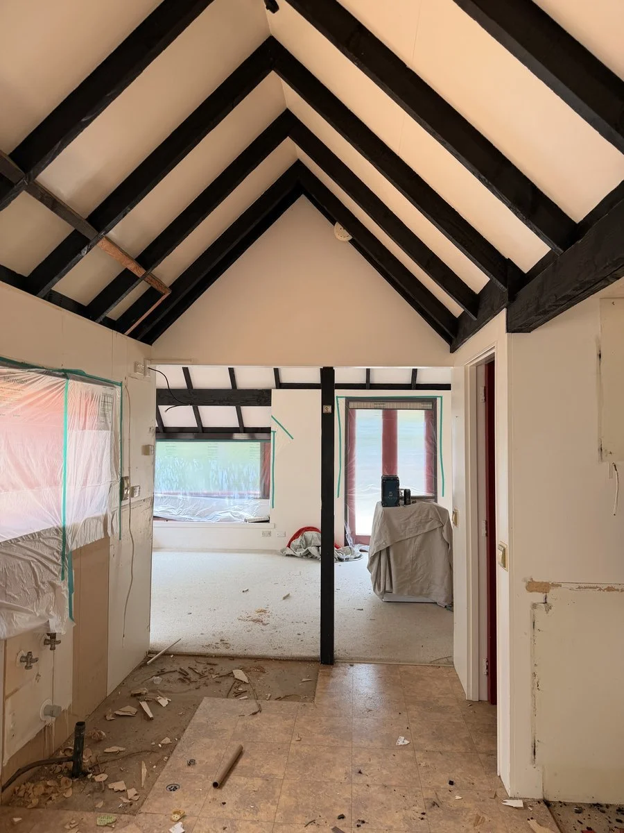 villa-interior-renovation-exposed-rafters-during-prep.jpg