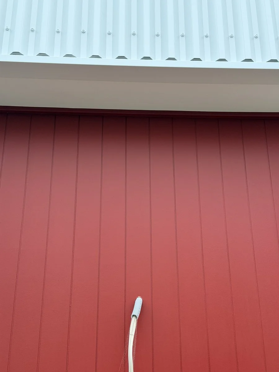 herrick-st-red-vertical-board-cladding-white-soffit.jpg
