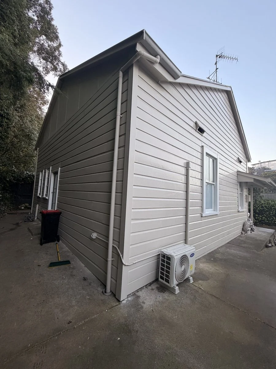 coote-road-exterior-side-elevation-freshly-painted-weatherboard.jpg