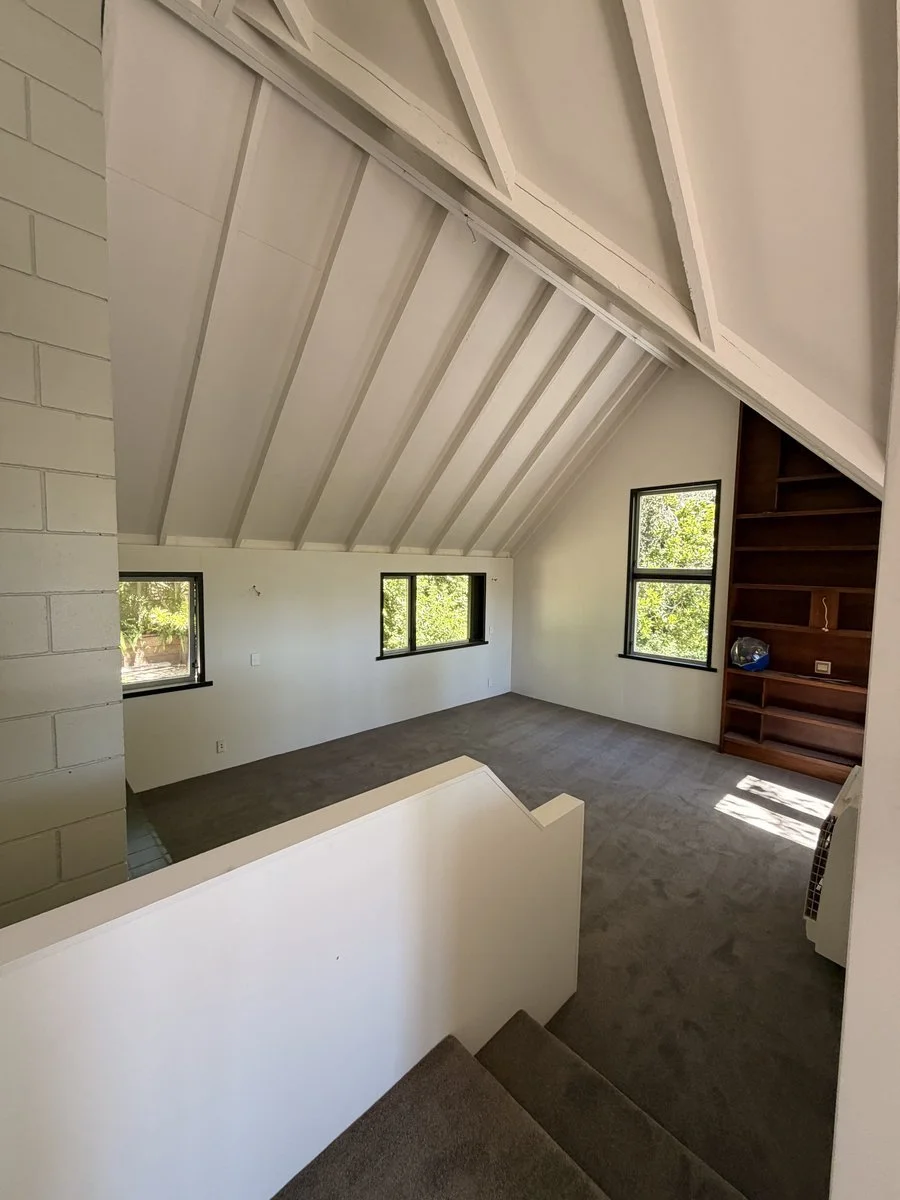 interior-upstairs-loft-white-painted-rafters-carpet.jpg