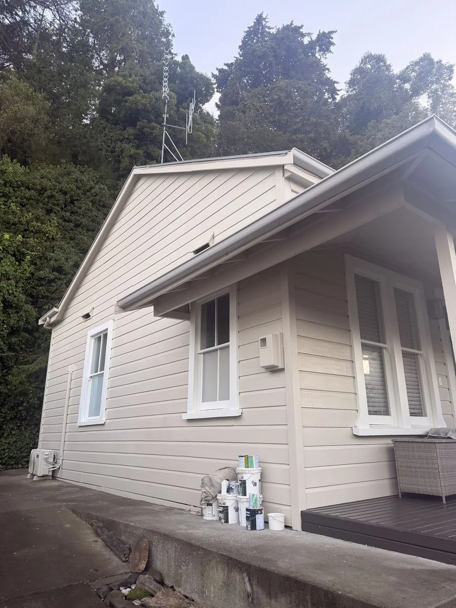coote-road-exterior-weatherboard-side-elevation-paint-cans.jpg
