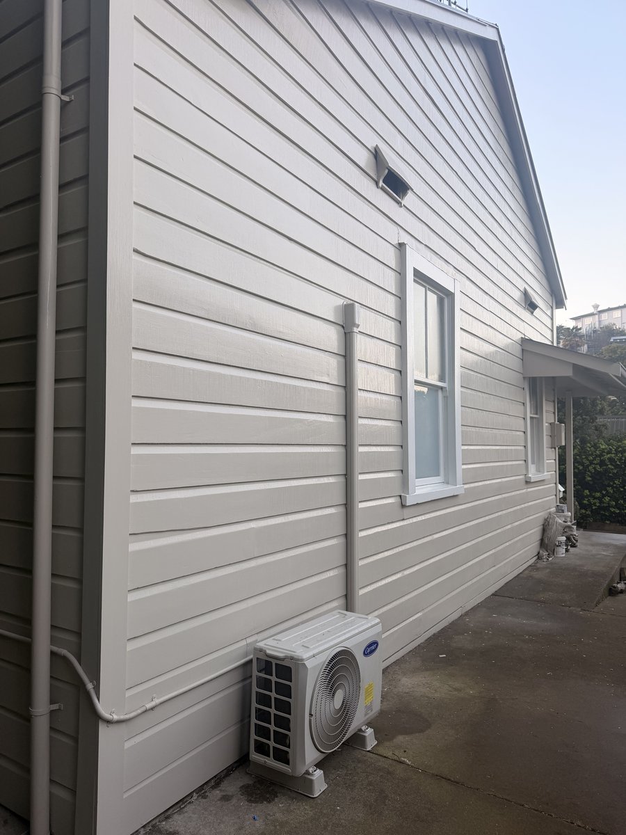 coote-road-exterior-weatherboard-side-wall-painted-white.jpg