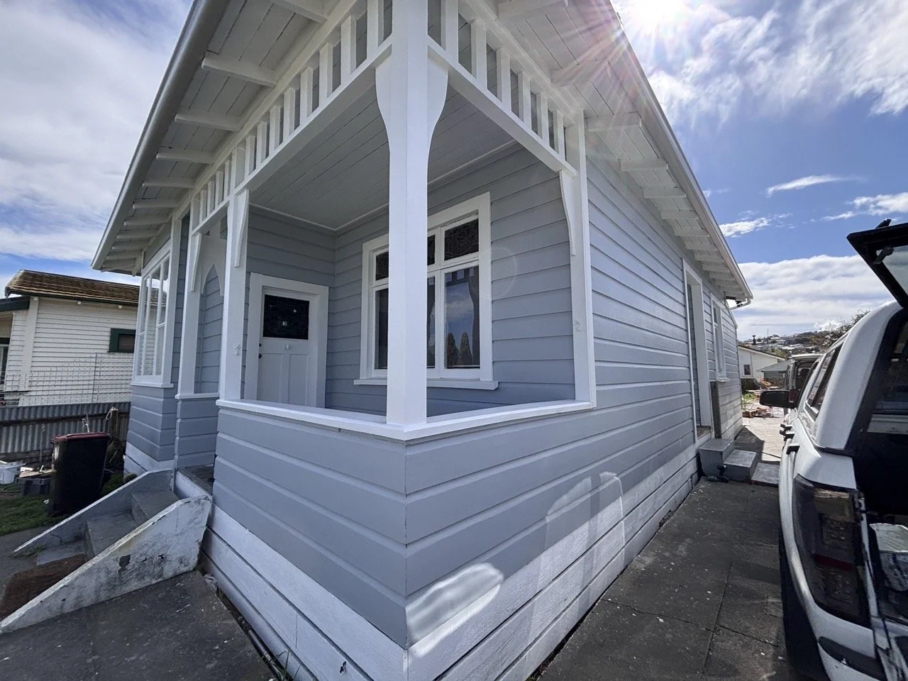 kennedy-road-exterior-repaint-grey-weatherboard-villa-front.jpg