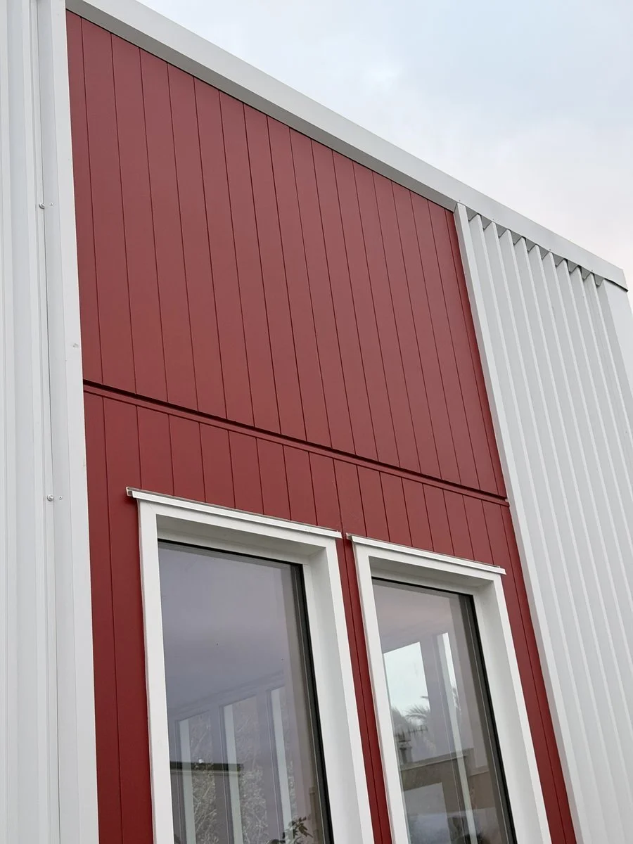 herrick-st-exterior-red-vertical-cladding-white-trim.jpg