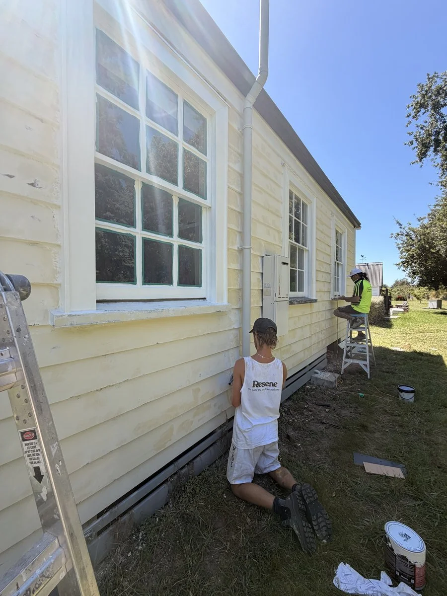 two-painters-exterior-weatherboard-house-yellow-resene.jpg